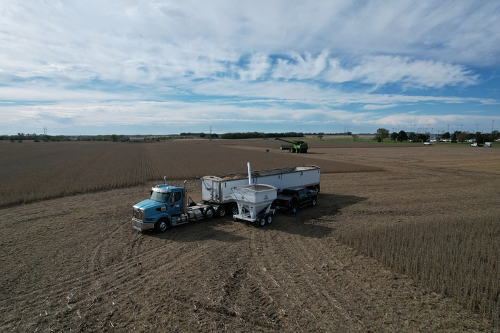 aerial view of grain cart and semi