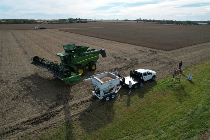 aerial view of combine and grain cart