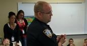 Fourth graders learn about a day in the life of an officer