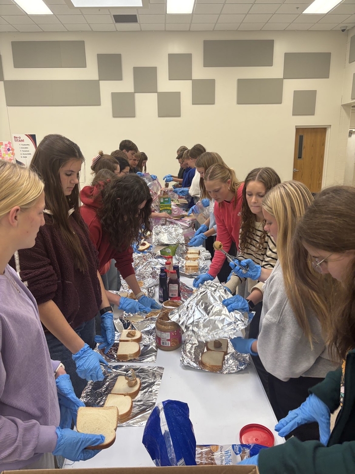 FBLA Members preparing meals.