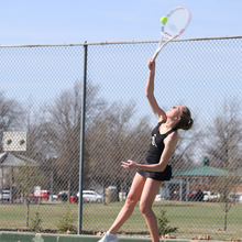 Tennis player jumping